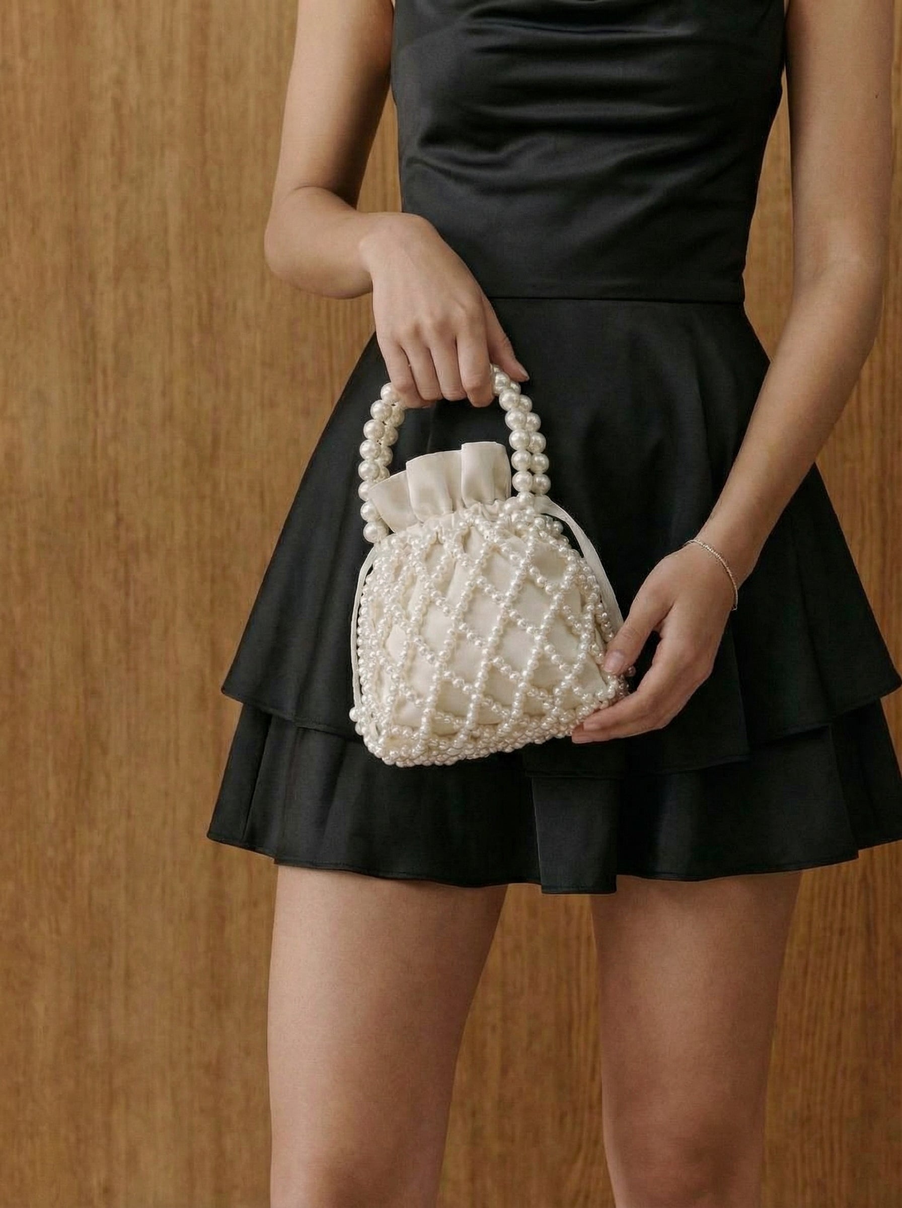 Aria Pearl Cage Bucket Bag